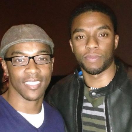Walter with Chadwick Boseman.